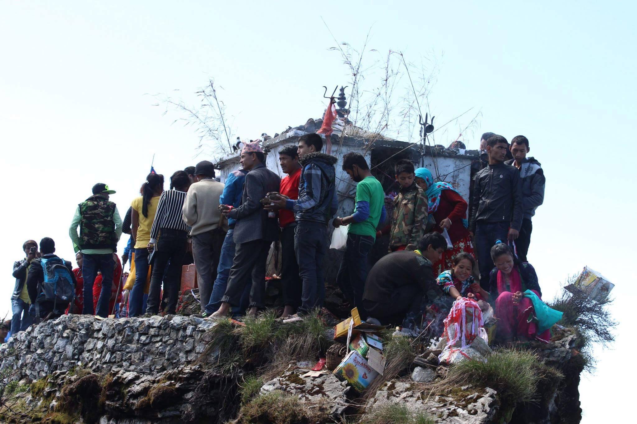 People waiting for their turn to worship the holy god at Ghumte temple, Galkot, Nepal